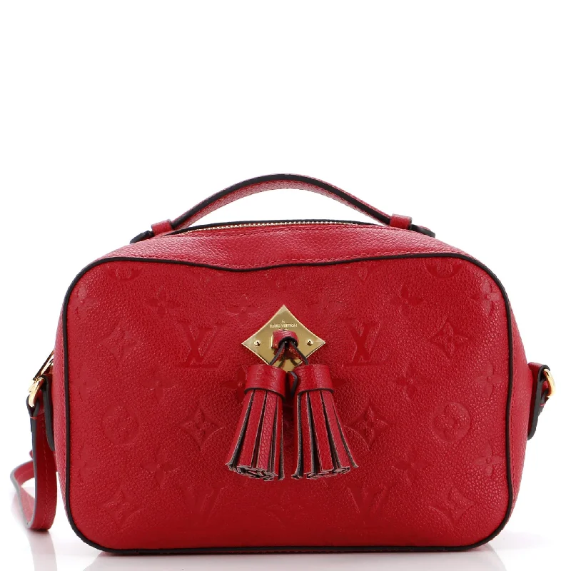 Shoulder bags with playful pom-poms for charm -Saintonge Handbag Monogram Empreinte Leather