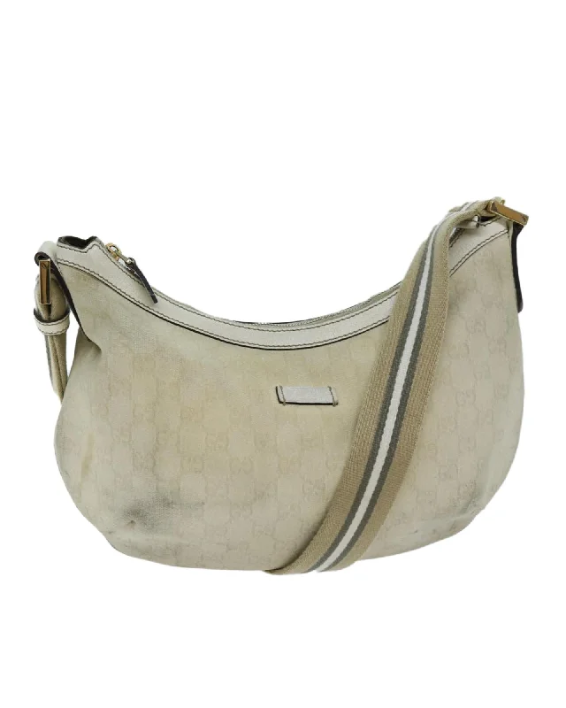 Stylish tote bags with metallic finishes for a modern and glamorous touch-GG Canvas Shoulder Bag with Beige and Green Tones