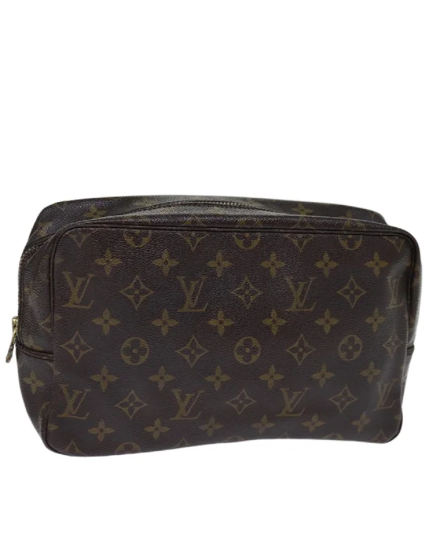 Tote bags with structured designs for a polished, professional look-Monogram Canvas Clutch Bag