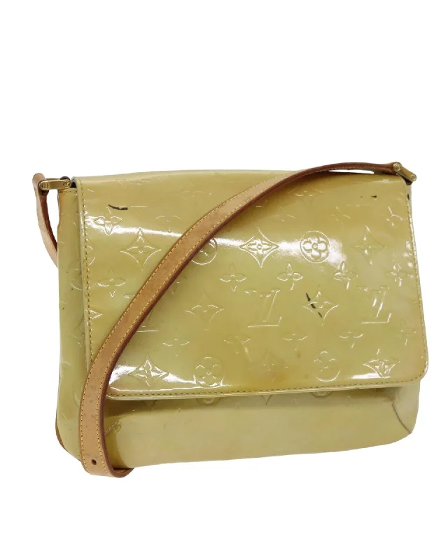 Tote bags with animal motif designs for a quirky and playful touch-Beige Patent Leather Shoulder Bag with Interior Pocket