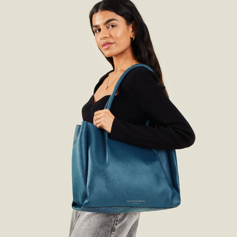 Handle bags with bold stripes for trendiness -Accessorize London Women's Blue Soft Shoulder Bag