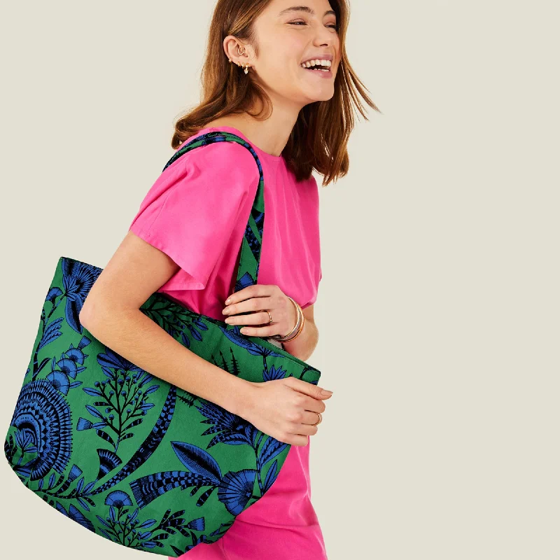 Handle bags with side pockets for organization -Accessorize London Women's Green Canvas Fan Print Shopper