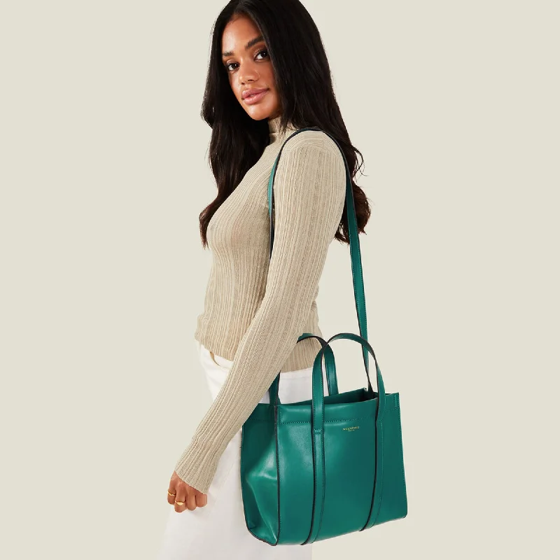 Handle bags with expandable sides for flexibility -Accessorize London Women's Teal Small Book Tote Bag