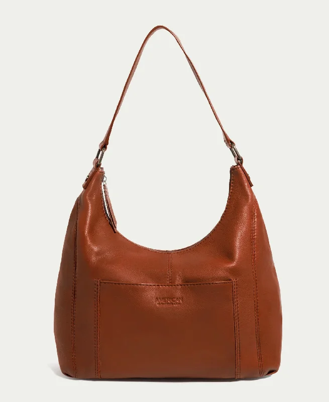 Handle bags with sturdy leather grip accents -Blake Hobo