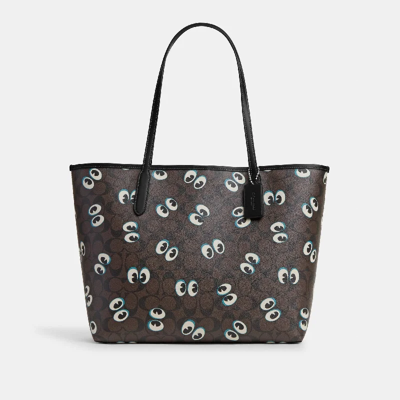 Handle bags with tropical prints for summer -Coach Outlet City Tote In Signature Canvas With Halloween Eyes