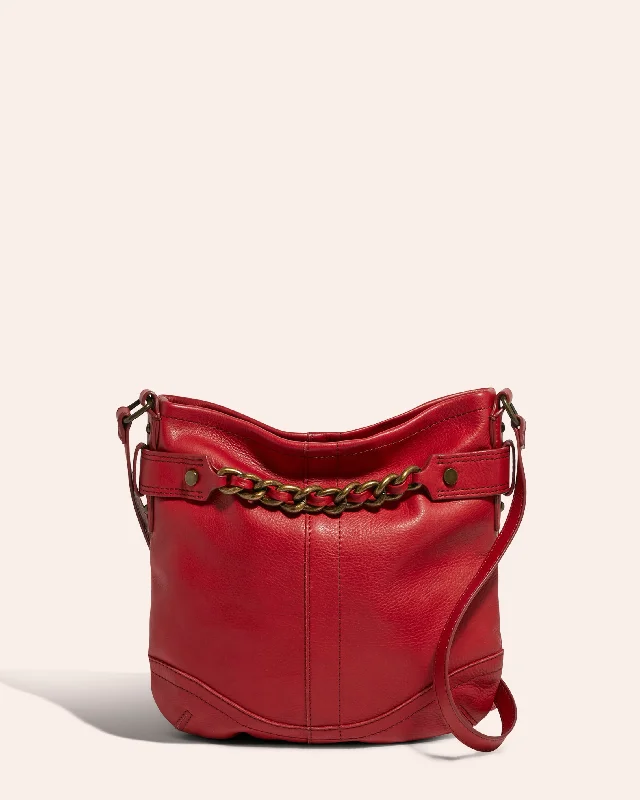 Handle bags with playful pom-poms for charm -Elton Crossbody