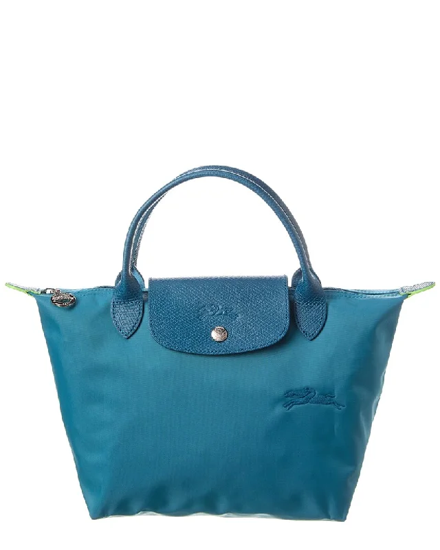 Handle bags with vintage vibes for nostalgia -Longchamp Le Pliage Green Small Canvas Handbag